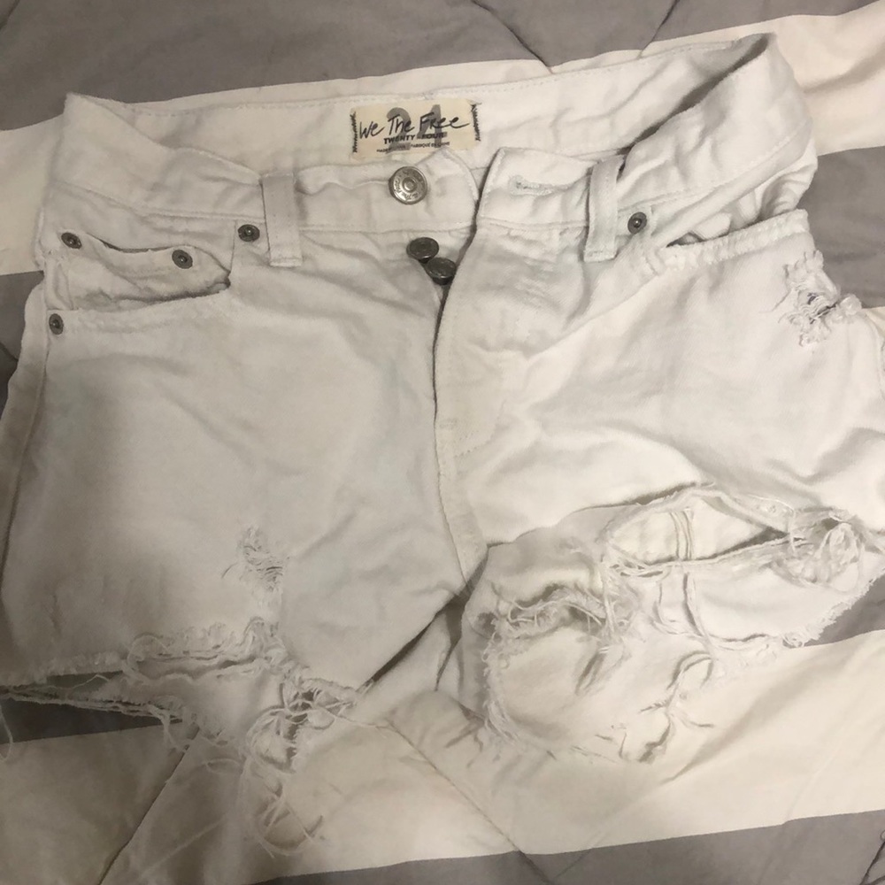Free People white tattered jean shorts button fly
